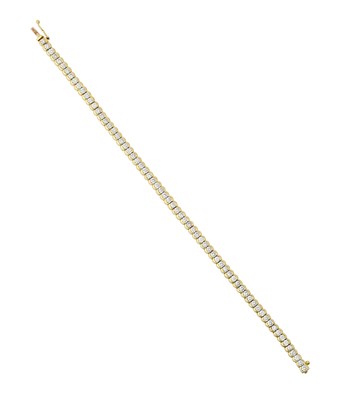 Lot 2327 - A Diamond Line Bracelet the sixty-seven round...