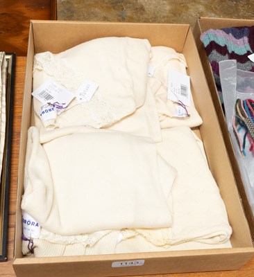 Lot 1143 - Four Brora Lace Trimmed Thermal Wear, in cream,...