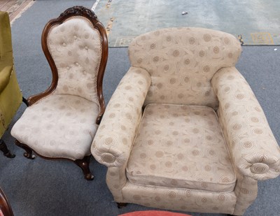 Lot 1350 - An Upholstered Armchair, with squab cushion,...