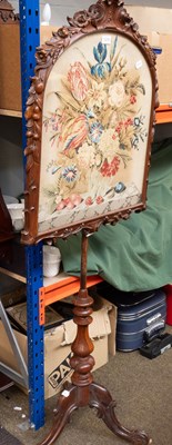 Lot 1219 - A 19th Century Carved Pole Screen, with floral...