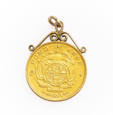 Lot 361 - A Half Pond Pendant, dated 1896, length 2.6cm