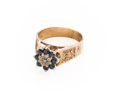 Lot 367 - A 9 Carat Gold Sapphire and Diamond Cluster...
