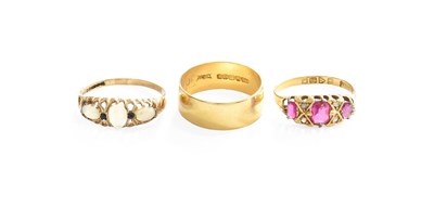 Lot 321 - An 18 Carat Gold Band Ring, finger size P1/2;...
