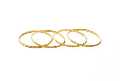 Lot 156 - Four Textured Bangles, inner measurements...