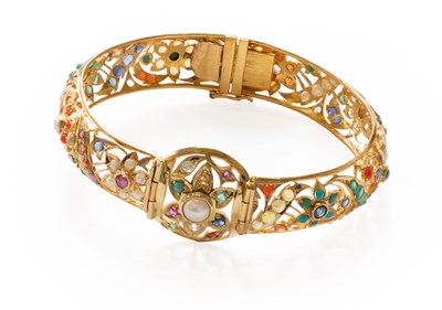 Lot 124 - A Multi-Gem Set Double Hinged Bangle, of...