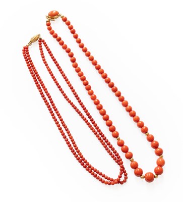Lot 114 - A Coral Necklace, graduated coral beads spaced...