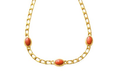 Lot 112 - A Coral Necklace, three oval cabochon corals,...