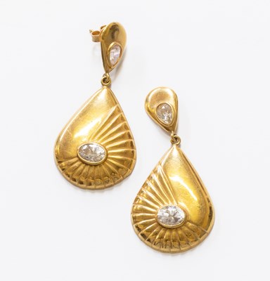Lot 93 - A Pair of Cubic Zirconia Drop Earrings, a pear...