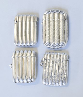 Lot 84 - Four Various Silver Vesta-Cases, each fluted...
