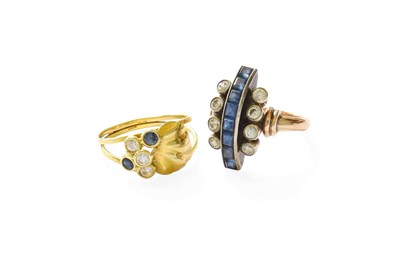 Lot 104 - A Sapphire and Cubic Zirconia Leaf Motif Ring,...