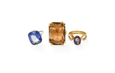 Lot 95 - A Synthetic Sapphire Ring, finger size L; A...