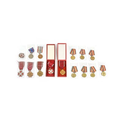 Lot 63 - Five Polish Crosses of Merit, two cased, in...