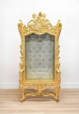 Lot 509 - A Giltwood and Gesso Vitrine, in Italian...