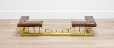 Lot 669 - An Early 20th Century Brass Club Fender, the...