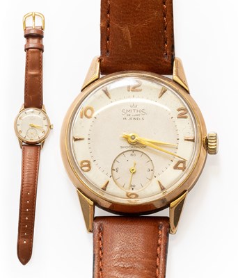 Lot 10 - A 9 Carat Gold Smiths De Luxe Wristwatch,...