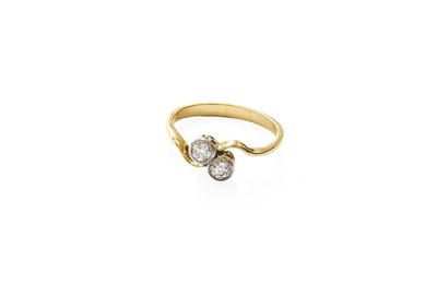 Lot 179 - A Diamond Two Stone Twist Ring, the old cut...