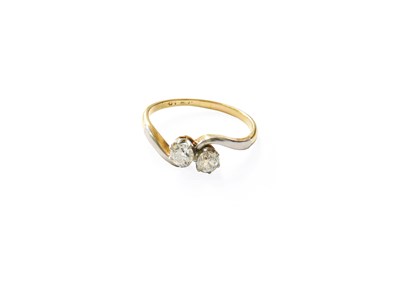 Lot 181 - A Diamond Two Stone Twist Ring, the old cut...
