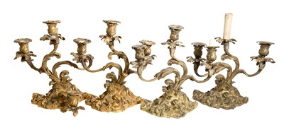 Lot 1221 - A Set of Four Gilt-Metal Three-Light...