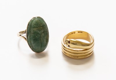 Lot 132 - An 18 Carat Gold Snake Ring, with ruby eyes,...
