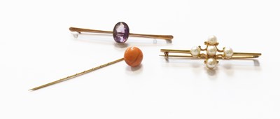 Lot 134 - A Coral Stick Pin, stamped '585', pin length 5....