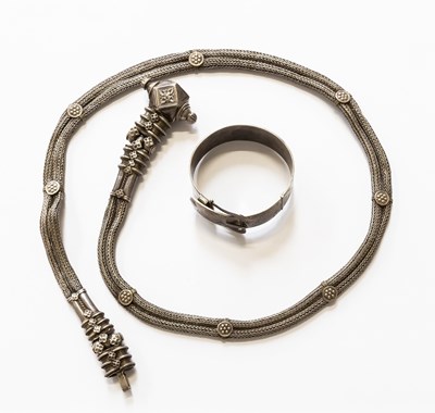Lot 82 - A Silver Bangle, with buckle fastening and...
