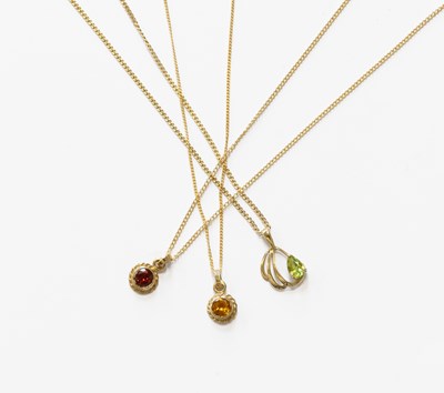 Lot 160 - A 9 Carat Gold Citrine Pendant on Chain, the...