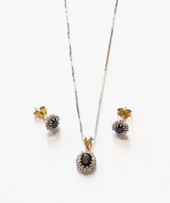 Lot 139 - An 18 Carat Gold Sapphire and Diamond Cluster...