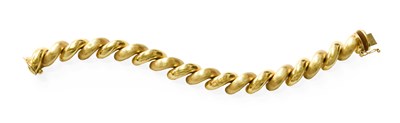 Lot 56 - A Bracelet, comprising of plain polished links...
