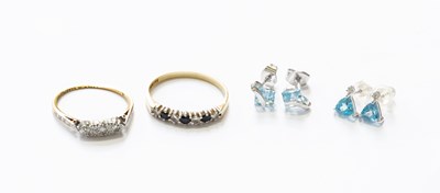 Lot 184 - A Diamond Three Stone Ring, stamped '18CT' and...