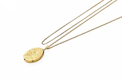 Lot 157 - A 9 Carat Gold Locket on Chain, the oval...