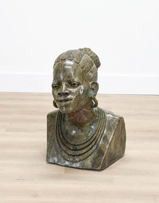 Lot 1058 - A Carved Green Verdite Bust of a Zimbabwean...