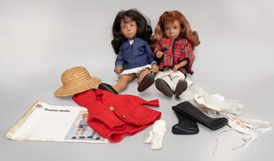 Lot 323 - Two Circa 1970's Sasha Dolls, with black and...