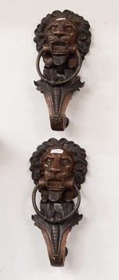 Lot 1200 - A Pair of Patinated Bronze Handles/Knockers,...