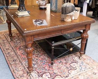 Lot 1353 - A Victorian Carved Oak Dining Table with egg...