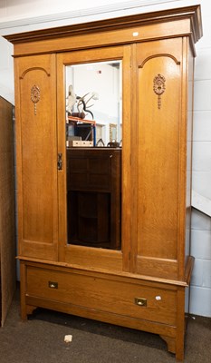 Lot 1215 - An Early 20th Century Arts & Crafts Oak Mirror-...