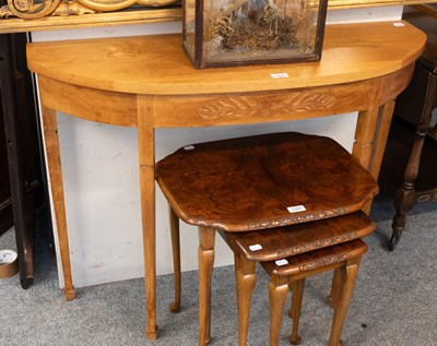 Lot 1327 - A 20th Century Nest of Walnut Tables, largest...