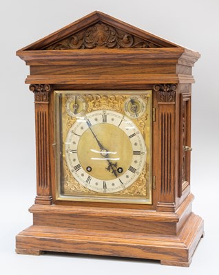 Lot 318 - A German Oak Quarter Striking Table Clock, oak...