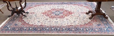 Lot 1184 - Chinese Carpet, the ivory field of scrolling...