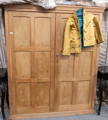 Lot 1360 - A 20th Century Pine Two-Door Cupboard, the...