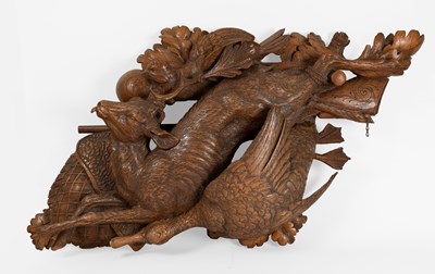 Lot 189 - A Black Forest Carved Linden Wood Game Trophy...