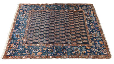 Lot 1282 - Kurdish Rug, the midnight blue field with an...