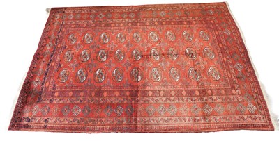 Lot 1285 - Afghan Rug, the terracotta field with three...