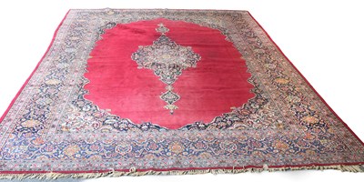 Lot 1138 - Kashan Carpet, the plain raspberry field...
