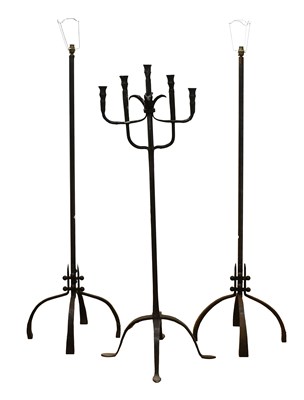 Lot 420 - A Forged Metal Five-Branch Candlestick, the...