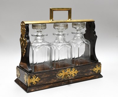 Lot 138 - A Victorian Coromandel Three-Bottle Tantalus,...