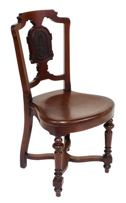 Lot 1285 - A Victorian Craved Chair, the splat carved...