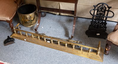 Lot 1267 - A 19th Century Brass Fire Curb, together with...