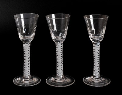 Lot 6 - A Set of Three Wine Glasses, circa 1760, with...