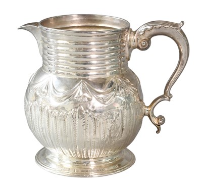 Lot 80 - A George II Silver Jug with a Later Spout, the...
