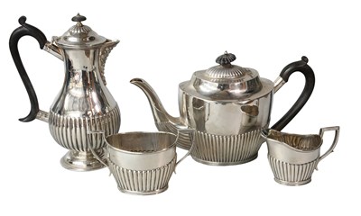 Lot 1 - A Four-Piece Assembled Victorian and Edward...